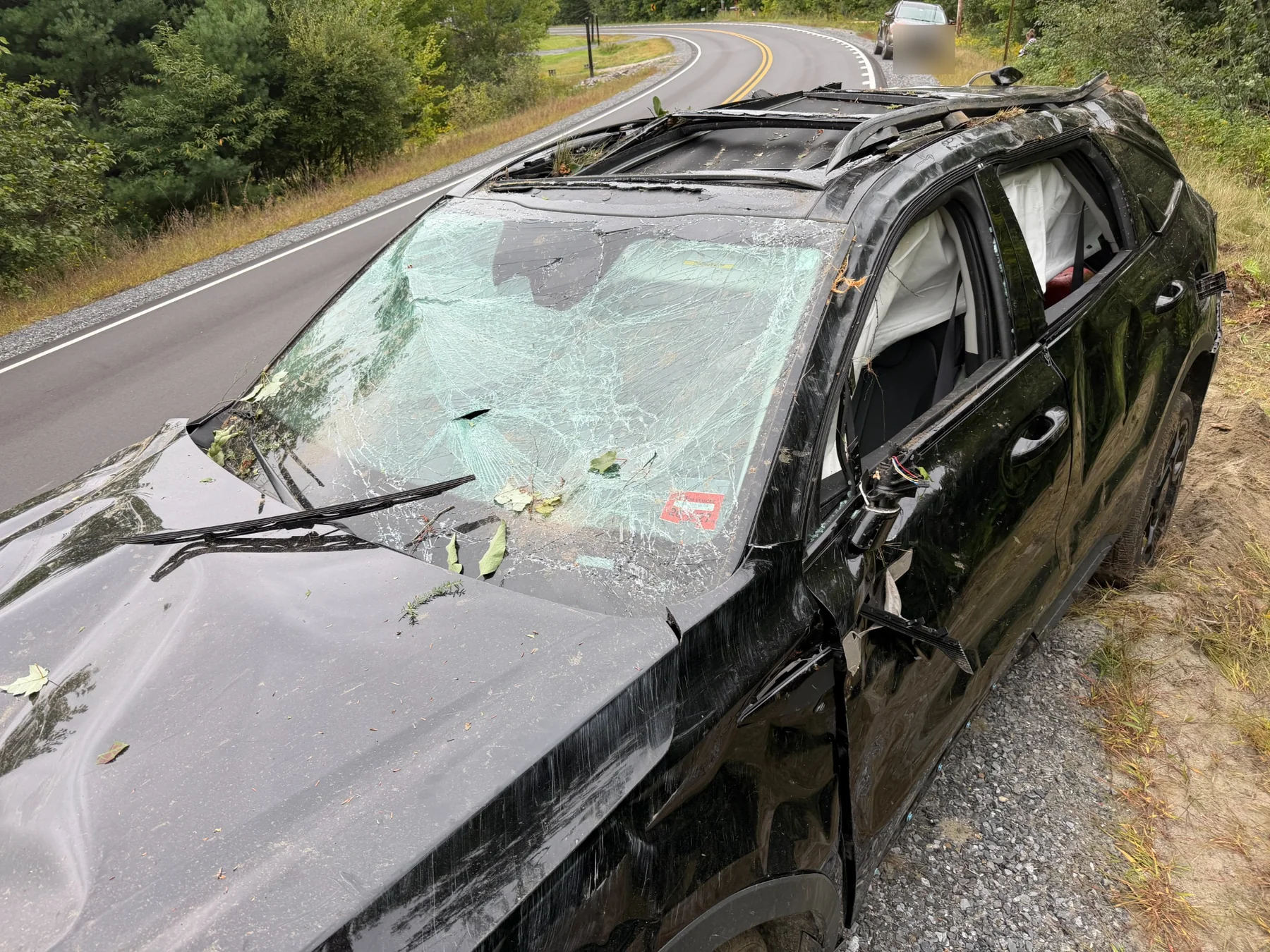 Accident-damaged vehicle requiring professional towing and recovery in Central Maine