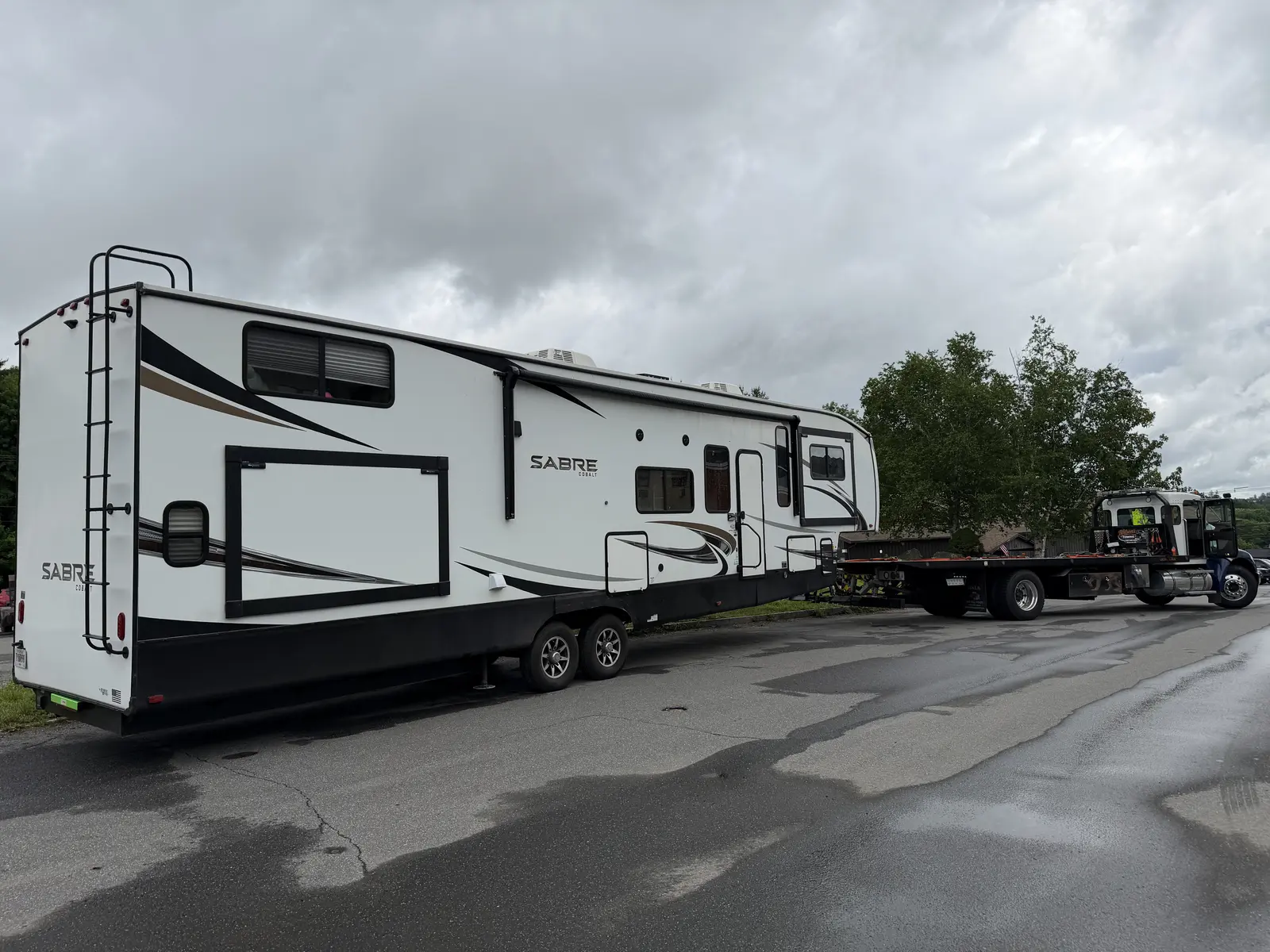 Wilson’s Towing transporting a fifth-wheel camper