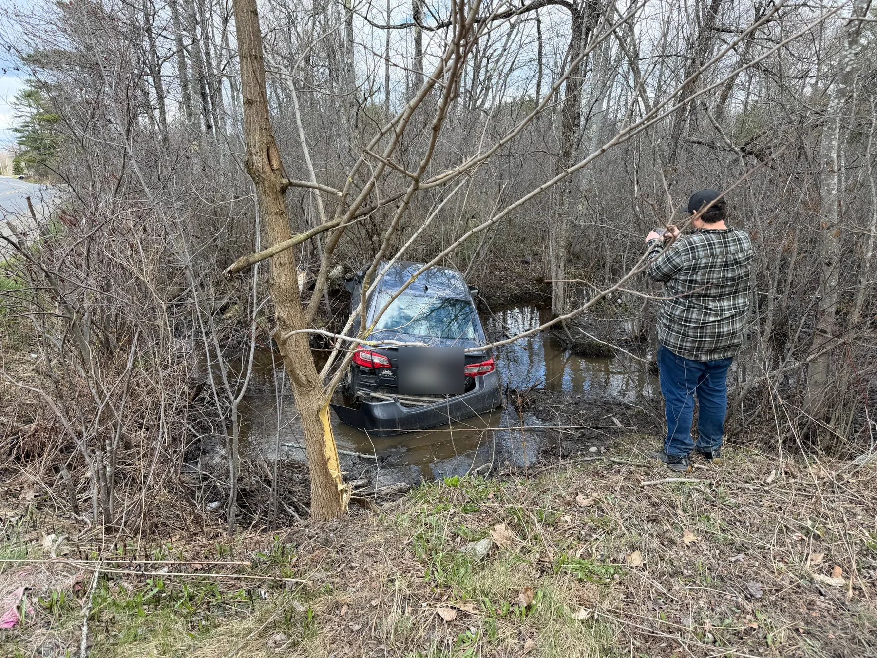 Vehicle in water requiring specialized recovery in Central Maine